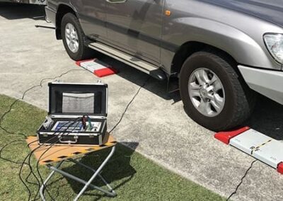 4WD vehicle being weighed on portable scales for GVM compliance
